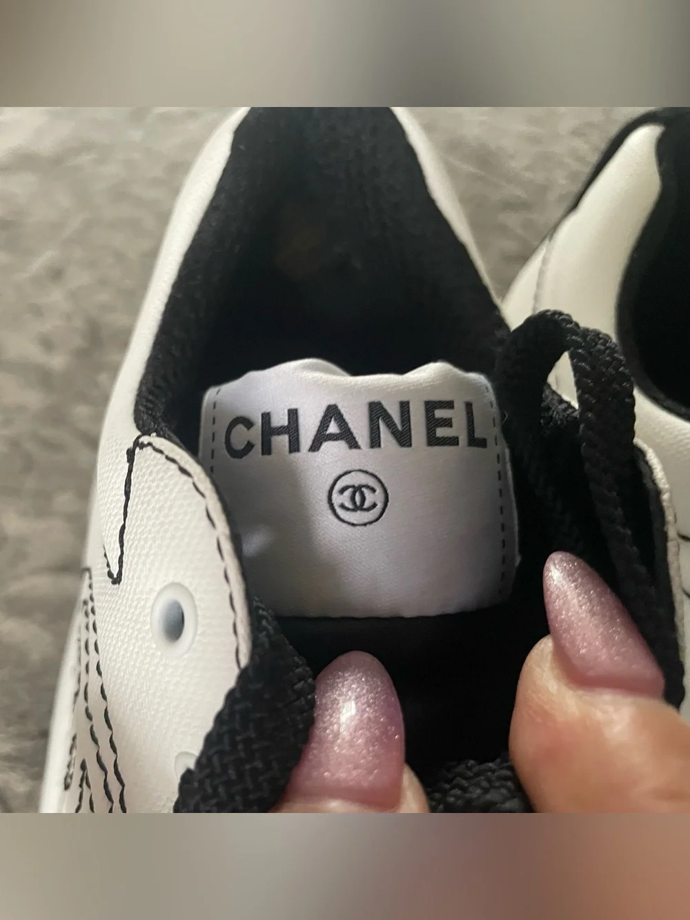 CHANEL White and Black Lace-Up Runner Sneakers